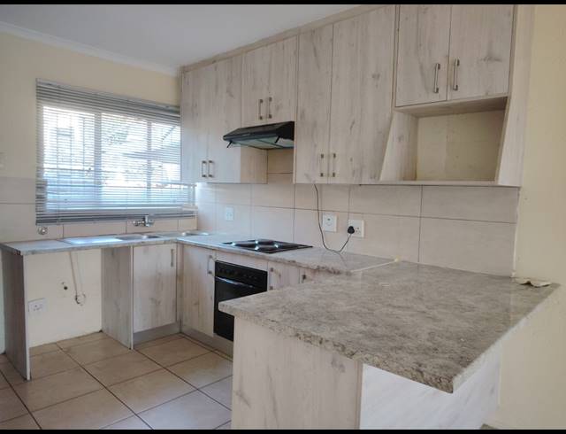 1 BEDROOM TOWNHOUSE FOR SALE IN HALFWAY GARDENS